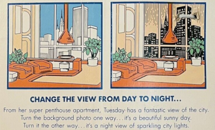 Line illustrations of Tuesday's penthouse with daytime views and nighttime. The familiar molded armchairs are in the foreground with white stools/tables to either side (these were up on the patio in the photographed set above); the fireplace and vanity are illustrated beyond, and a potted plant sits next to the window. The only difference between the two frames of this illustration is the scene outside, going from blue skies and light-colored buildings to a brown sky with black buildings and lighted windows. Text reads, "Change the view from day to night... From her super penthouse apartment, Tuesday has a fantastic view of the city. Turn the background photo one way... it's a beautiful sunny day. Turn it the other way... it's a night view of sparkling city lights."