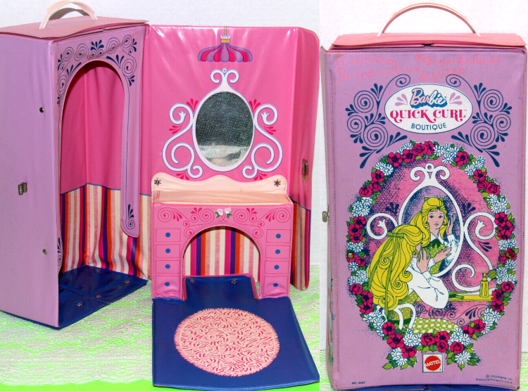 Tall, thin rectangular case in lavender and pink. Exterior graphic shows blonde Barbie wearing what looks like Quick Curl Kelley's green dress, sitting before a mirror, the scene garlanded by flowers. The box opens ot a simple counter, floor with rug graphic, and closet space to store clothes. 