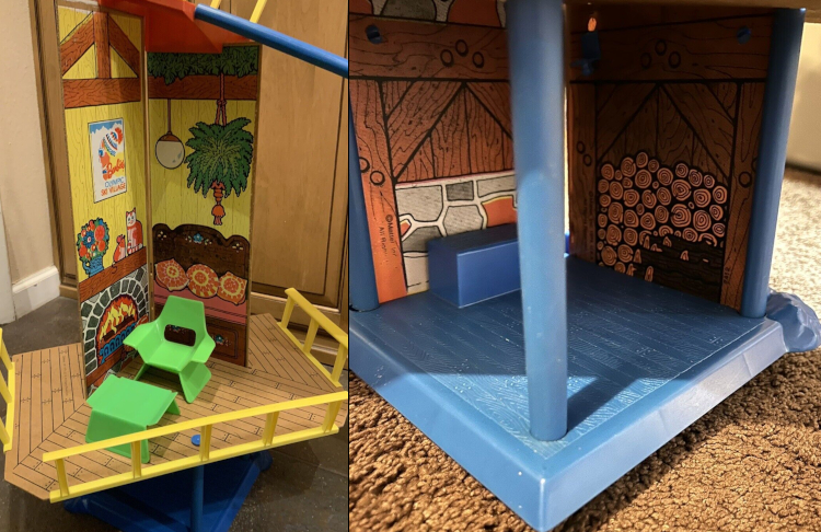 Two color photographs. One shows two walls of a "room." One wall has an illustrated fireplace with cat and mouse figures and vase of flowers atop, plus a poster with Barbie in profile that says Barbie's Olympic Ski Village. Second wall shows a double bed with pink and yellow pillows, wood foot and headboard with little blue flower decorations, a spherical pendulum light, and potted plant hanging from the ceiling. Both have wooden beams along the top, and the ski slope can be seen starting to one side. In front of the walls is an angular green chair with armrests and matching stool or footrest. All are on a wood-planked-style floor that extends past the structure as a patio and has low yellow railing along the edges. Second picture shows what's below the living area: more wood beamwork illustrated on the walls, plus fieldstone on the fireplace side. A stack of firewood is illustrated on one panel and a plain bench or seat is molded in plastic to the other side. The floor and supports are of blue plastic.