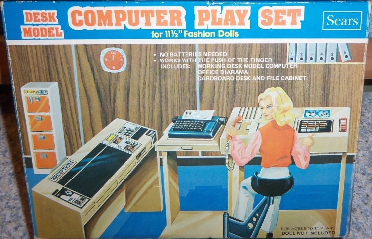 Box art showing a color illustration of a similar set to the Airline Reservation System. The illustration shows the wood-paneled wall with a single clock, the Top Secret filing cabinet, and the two desk units: Reception, with computer elements clearly depicted (black screens and various toggles) plus the piece with typewriter, phone, and, int his view, magnetic reels and other gizmos. A blonde character sits in the attached bucket seat. Text reads, "Desk Model Computer Play Set for 11 1/2" Fashion Dolls; Sears; No batteries needed; works with the push of a finger; includes: - working desk model computer - office diarama [sic] - cardboard desk and file cabinet; for ages 5 to 11 years, doll not included."