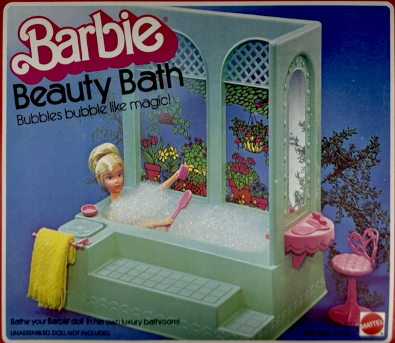Packaging for "Barbie Beauty Bath; Bubbles bubble like magic!" shows an aqua-colored plastic structure consisting of two tiled steps up to a bath, with walls on two sides including large arched windows with greenery and flowers screened onto clear platic. On the outside at one end is a pink semicircular shelf attached to the side of the structure with a pink low-backed swivel stool and an oblong mirror attached to the wall. The mirror is surrounded with studs that suggest lightbulbs although they are of the same aqua plastic as the structure. A yellow towel hangs at the far end of the bath. A Barbie with mod face but no rooted lashes--like the Sweet 16 doll, maybe--and her hair in a bun sits in the bath holding a couple pink plasti cbrushes, covered in foam. This part of the image appeared in the image at the top of the post.