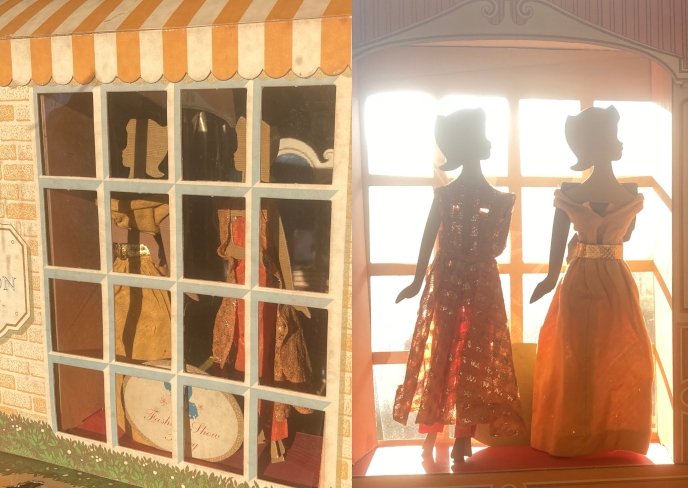Two of the ponytailed cardboard sillhouettes stand before the window, now drenched with sunlight. They are dressed in Barbie's Dinner at Eight and Golden Evening fashions. One view shows the shop from outside, and the fashions from the front; a second shows them from the back, from within the shop, from which angle the sunlight washes out the fashions' colors.