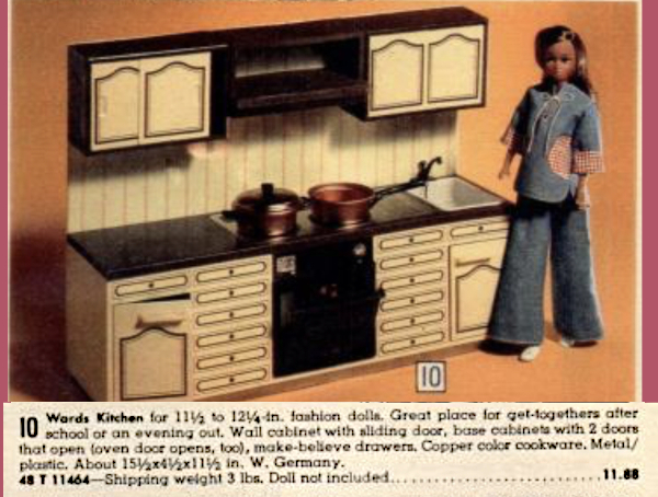 Black-and-white or black-and-cream version of the kitchen for about $12. The counter is black, the backdorp is white wood paneling, and the cabines and drawers are white with black trim. For once, Barbie is not shown; the doll looks like a Maddie Mod or similar, with dark skin, long straight dark hair, and a denim tunic and flared slacks.